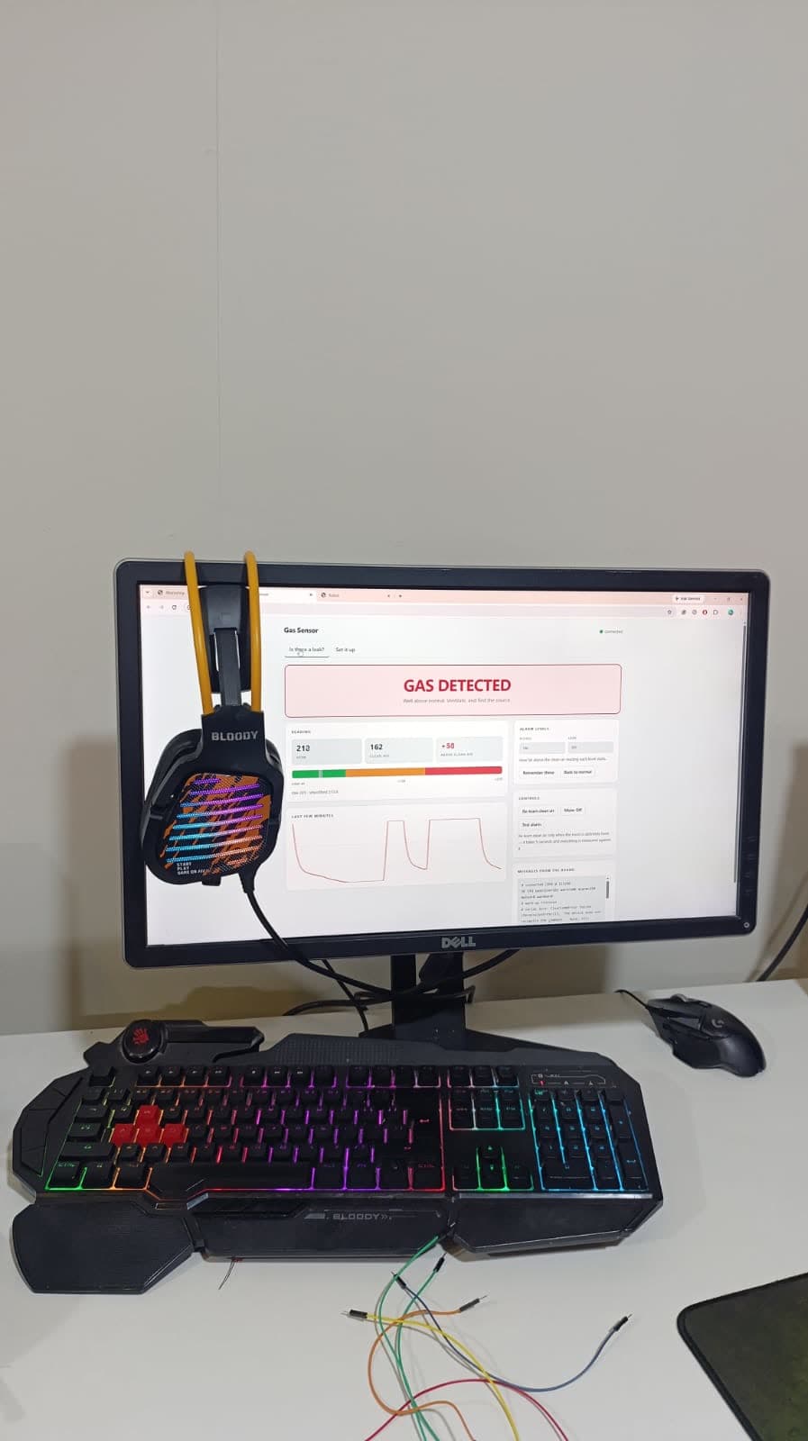 A student-built gas-detector web dashboard reading GAS DETECTED from a live sensor